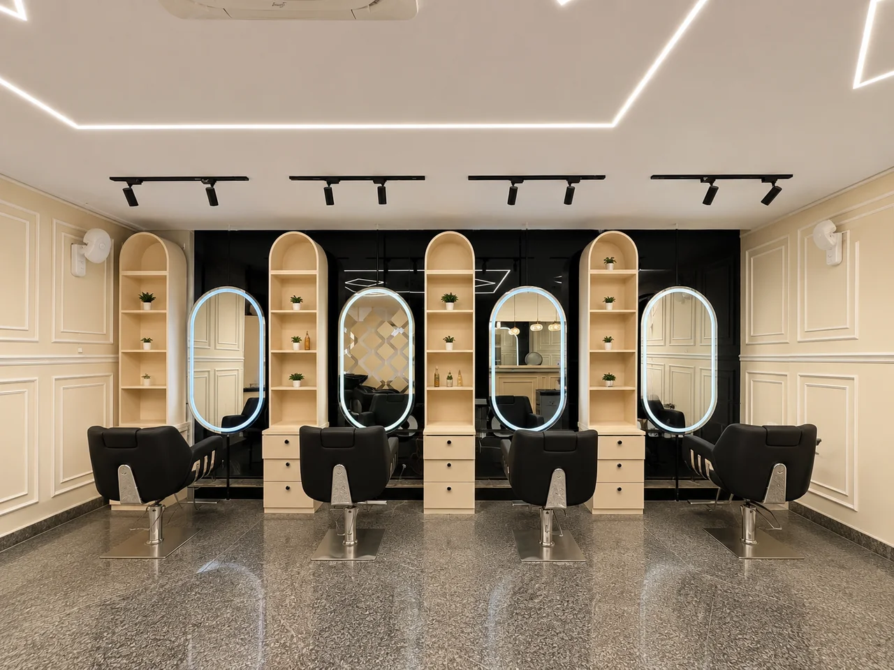 Macau styling stations with mirrors and salon chairs